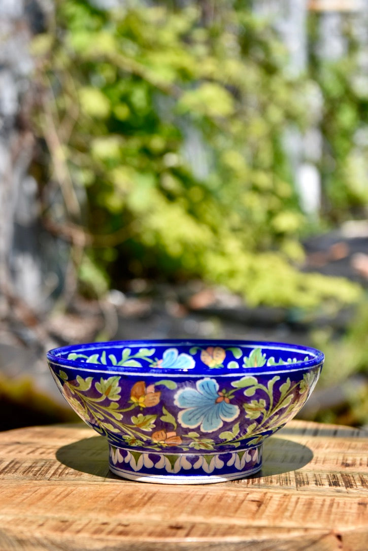 Bol aux motifs floraux orange, turquoise et bleus